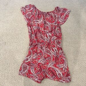 Red romper with paisleys